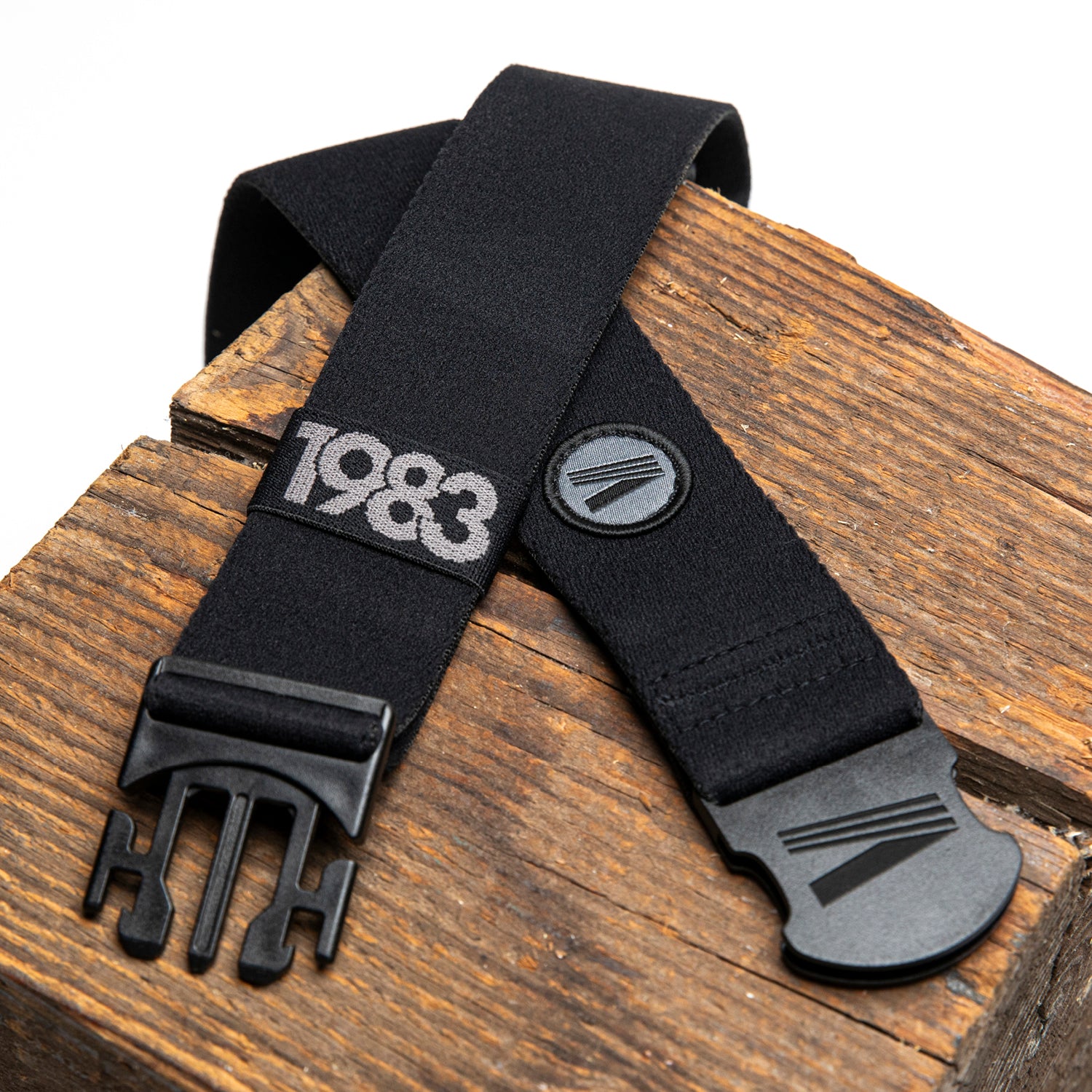midnight black performance wear flex belt on a table
