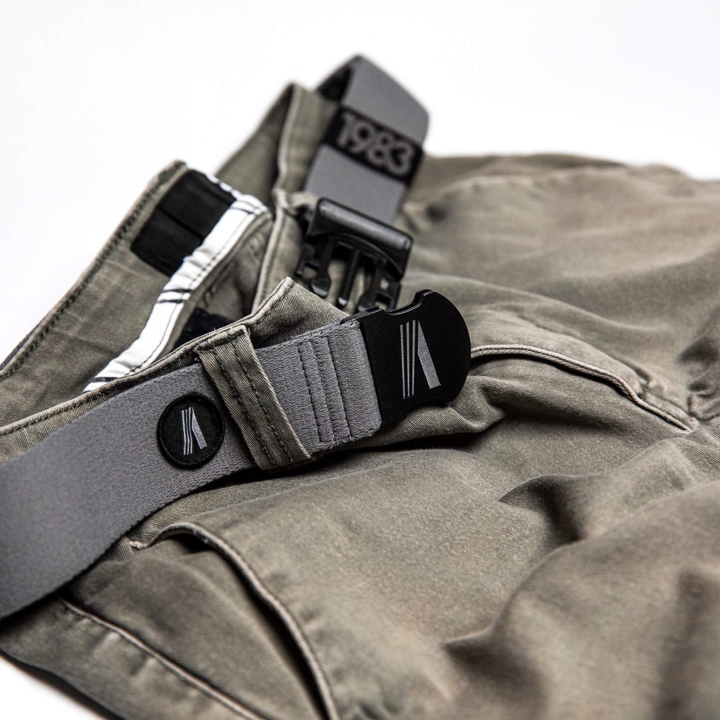 ash grey adjustable activewear belt wrapped around pants